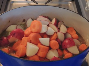 Add potatoes and carrots