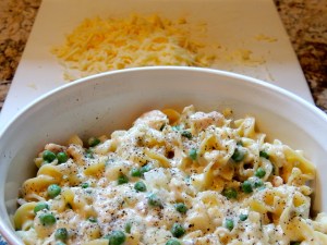 Stir together, save a little cheese for the top!