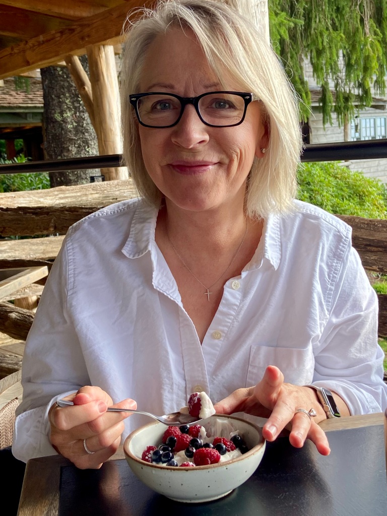 Barbara Stroud (me) artfully enjoying my delicious food and feeling right at home at the Swag in NC. Best homemade yogurt and berries from the garden!