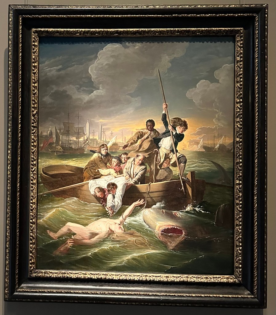 Painting in gold frame, subject men in a boat, trying to save a man in the water, shark, one man with a harpoon, buildings and boats in distance
