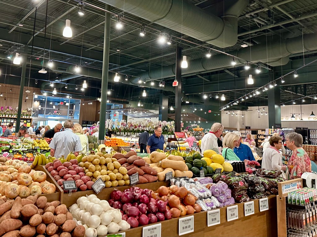 inside grocery store, produce section, many people, Fresh Market
