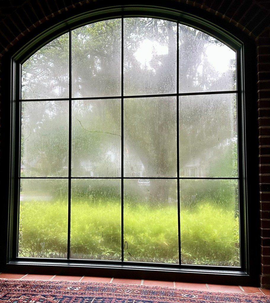arched window, morning rain, fogged window