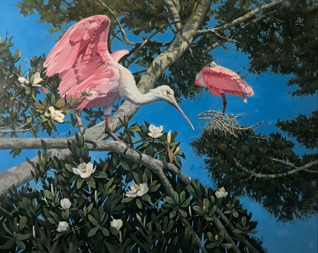 bright blue sky, magnolia tree with blooms and two large pink birds.