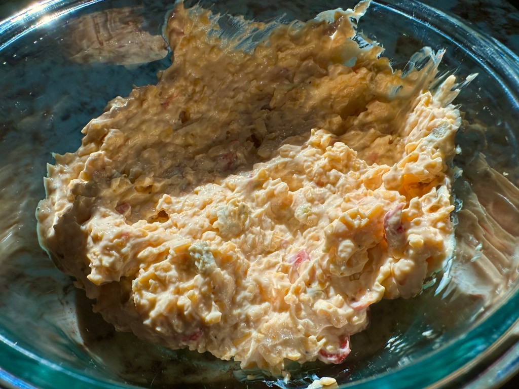 homemade pimiento cheese in a glass bowl